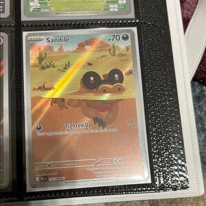 Pokemon Sandile Trading Card - Orange and Brown